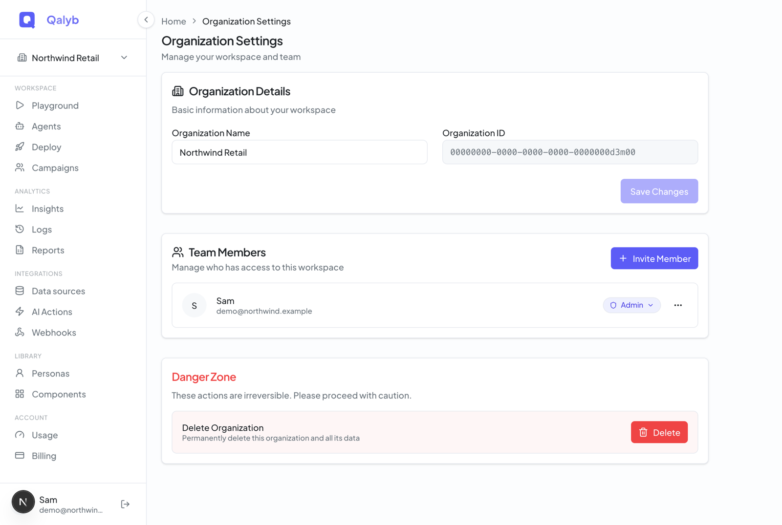 Organization page showing Organization Details with name and ID, plus a Team Members list with role pills